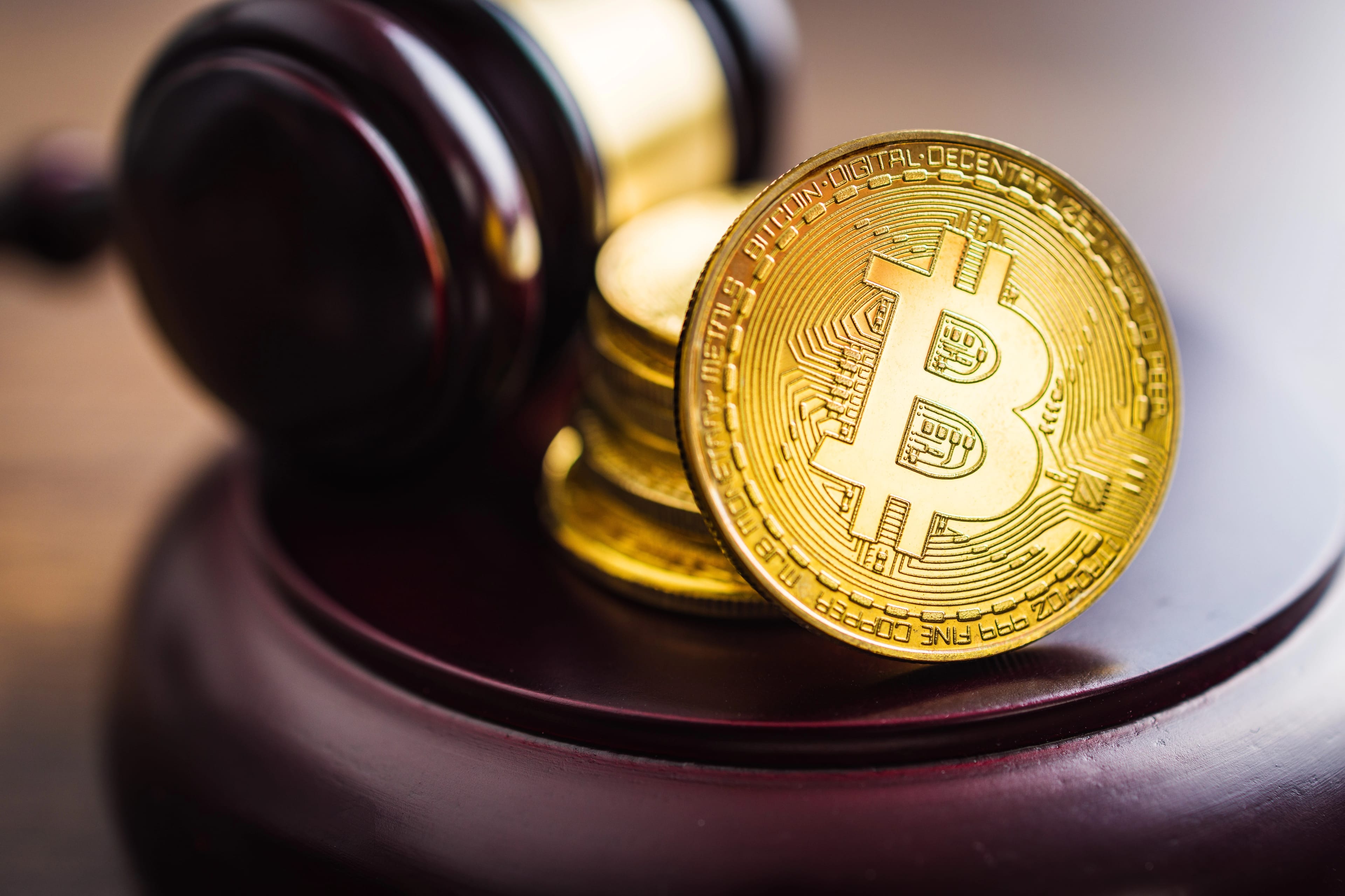 Cryptocurrency.,Bitcoin,Virtual,Money.,Golden,Coins,And,The,Judge,Gavel.